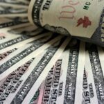 notas de dólar - CPI do Reino Unido