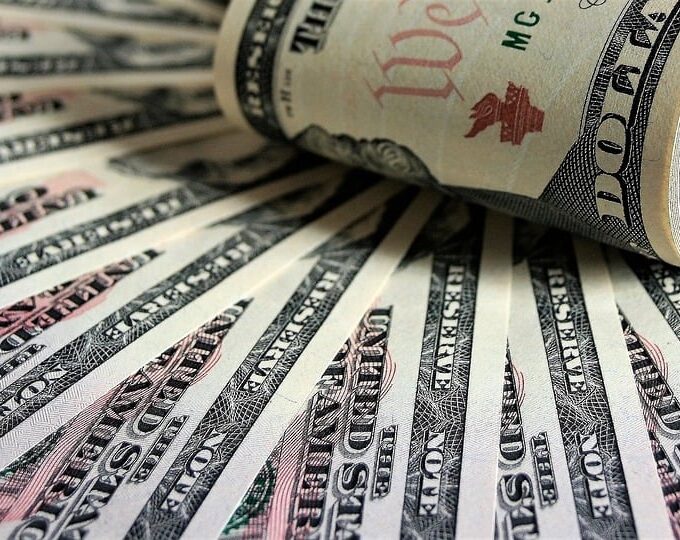 notas de dólar - CPI do Reino Unido