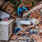 família atingida por enchente em MG